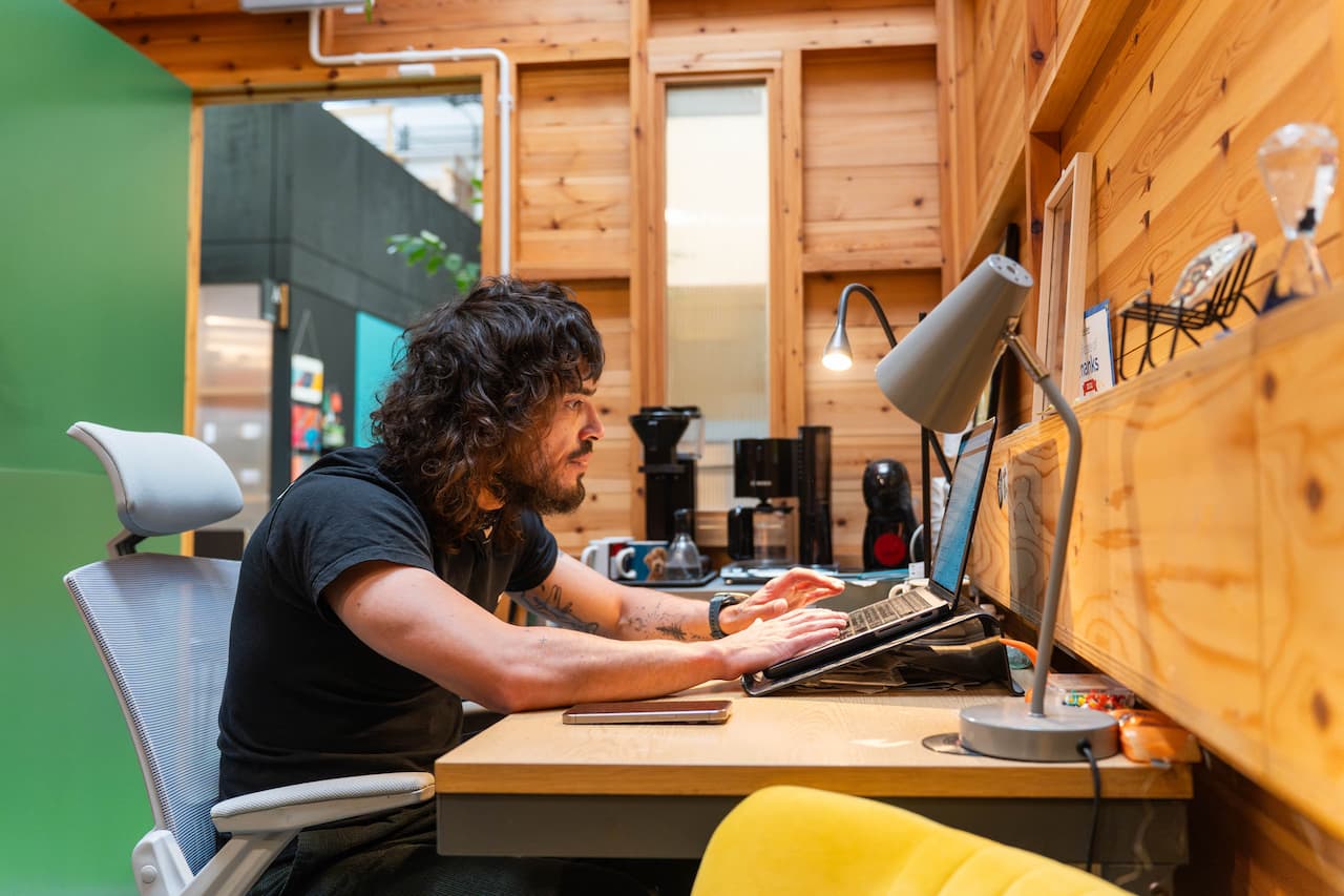 Jack Dotchin, co-founder and Client Services Director at Flatdot Marketing, working in the Flatdot studio